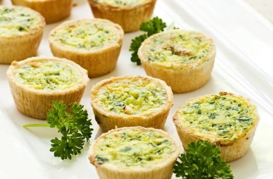 Plate of many mini bite size quiche appetizers